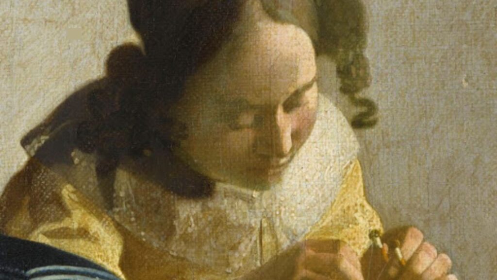 "The Lacemaker (La Dentellière)" by Johannes Vermeer